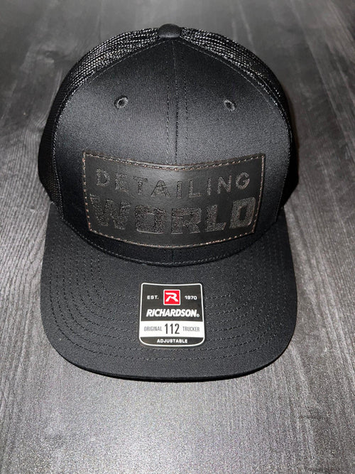 black trucker hat
