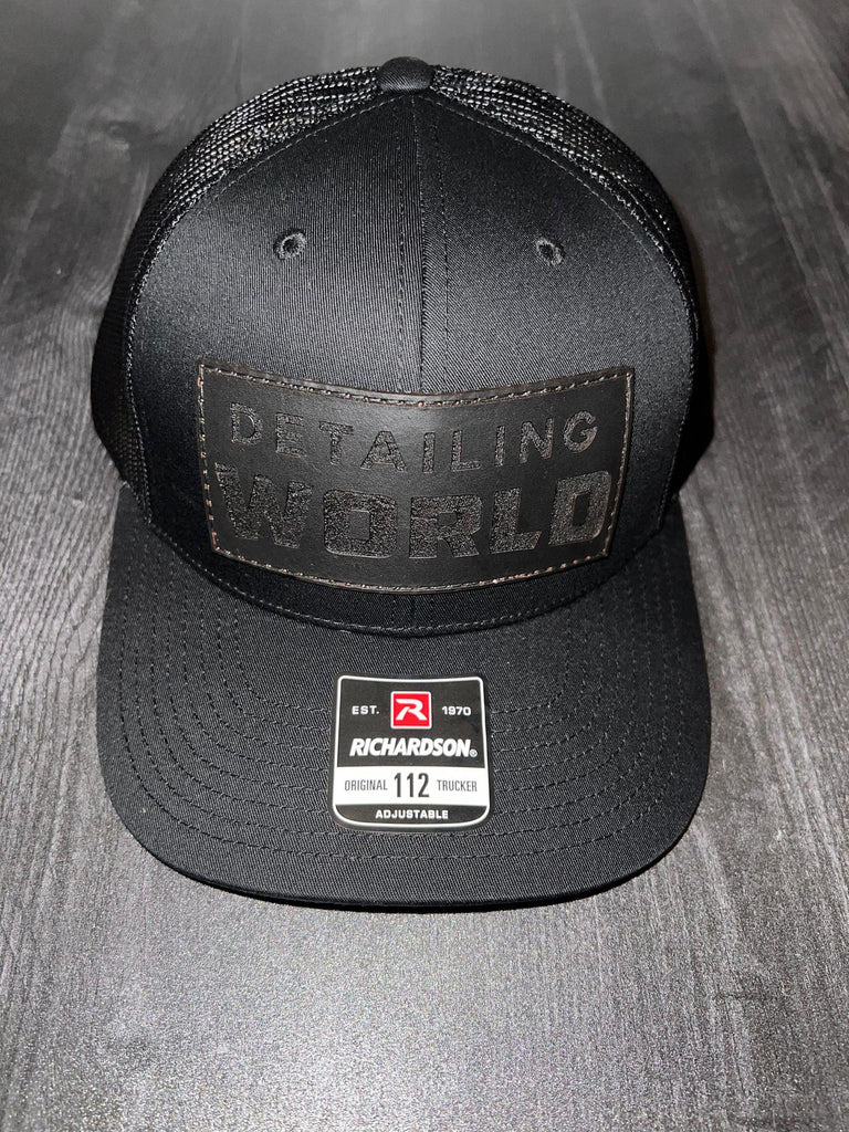 black trucker hat